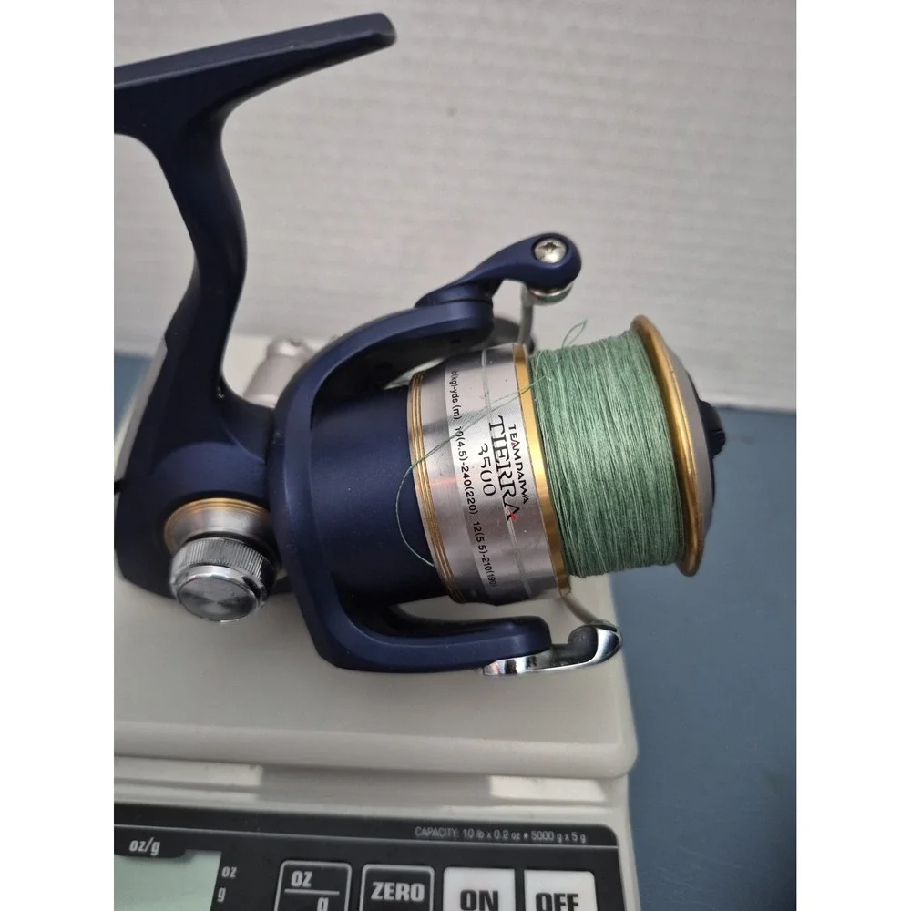 Team Daiwa Teierra 3500 Fishing Spinning Reel Prespooled 12 Ib Braid